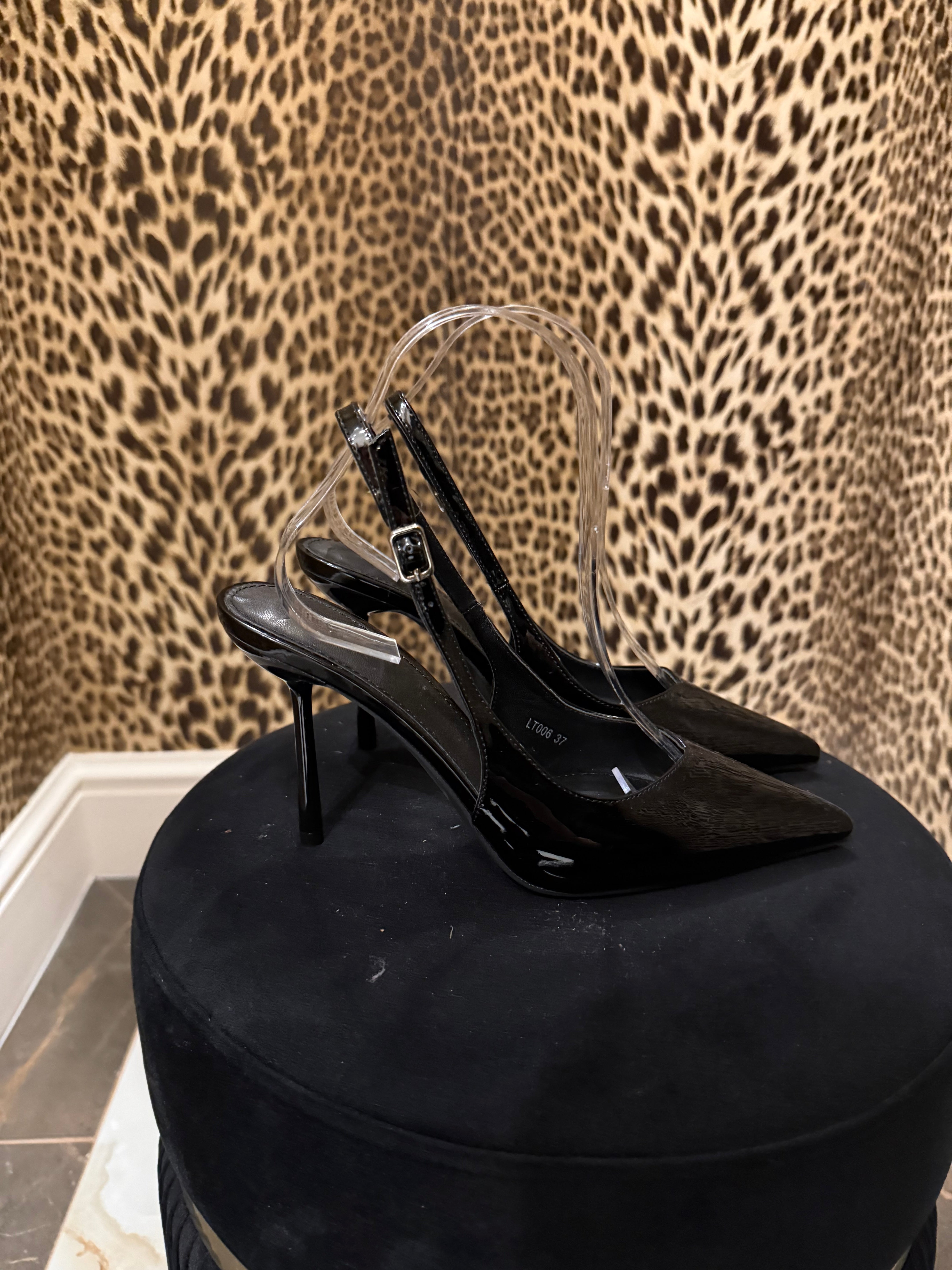 Décolleté in vernice